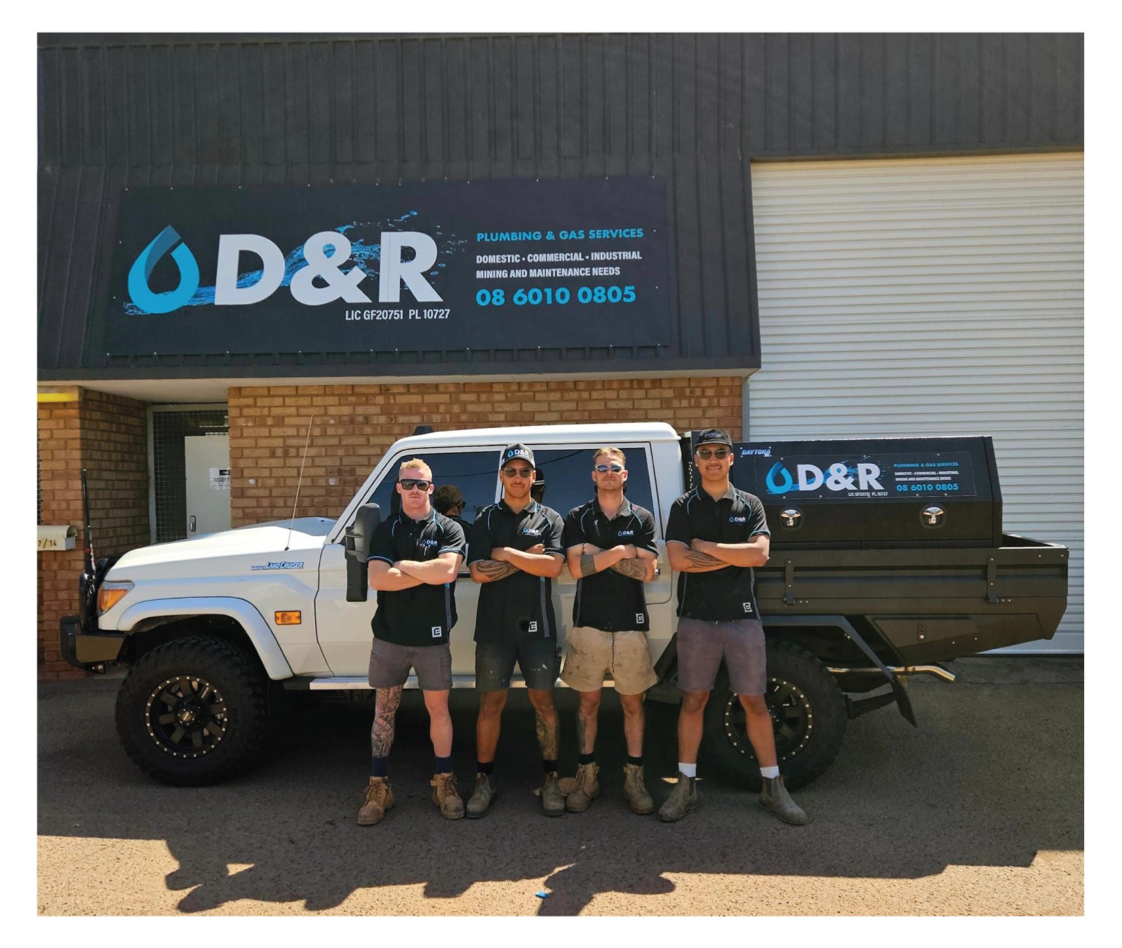 The D&R Plumbing & Gas crew with their service vehicle outside the Kalgoorlie workshop